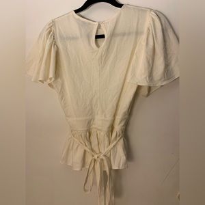 A cute white bow shirt